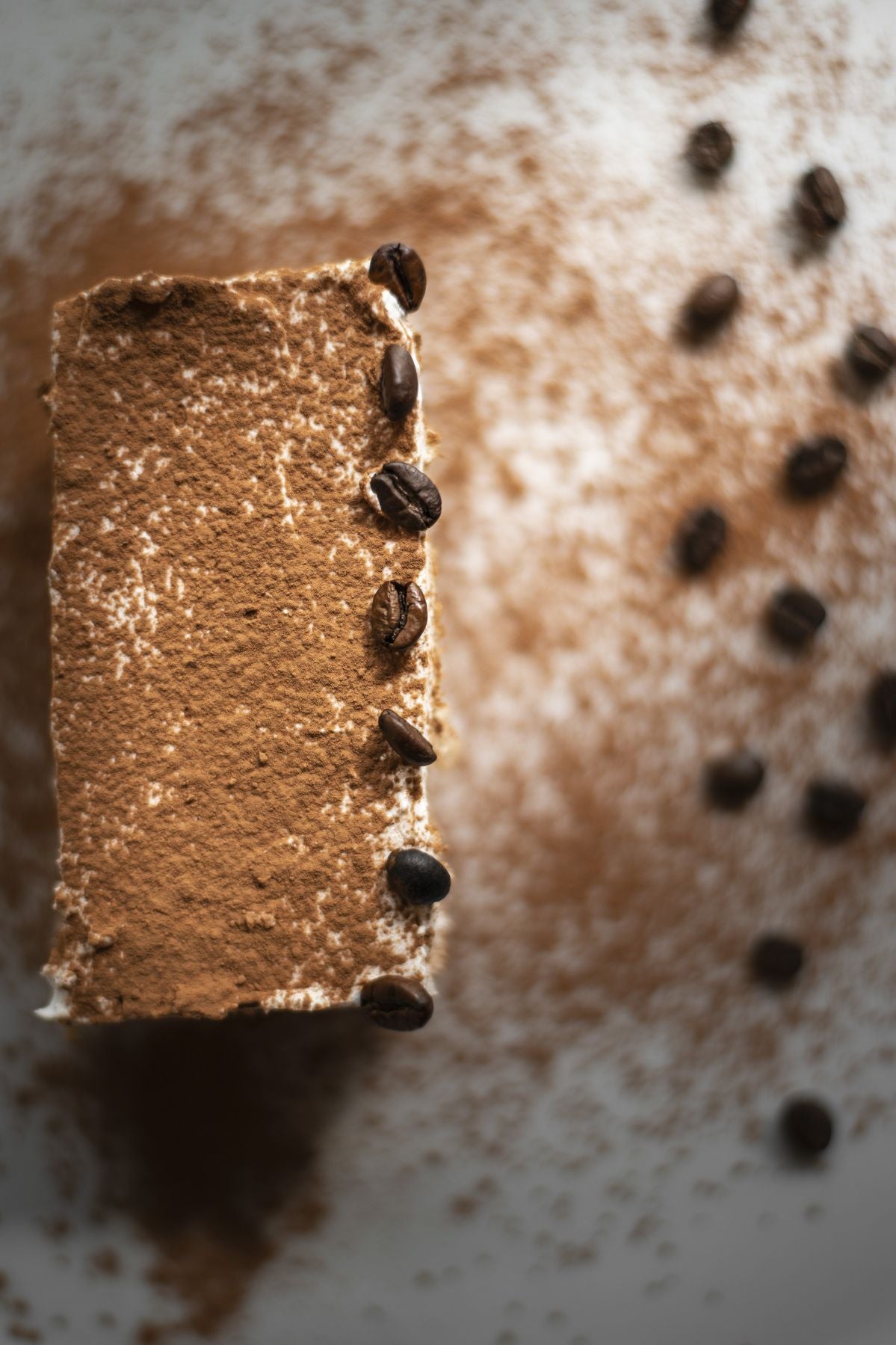 A coffee dessert dusted with cocoa